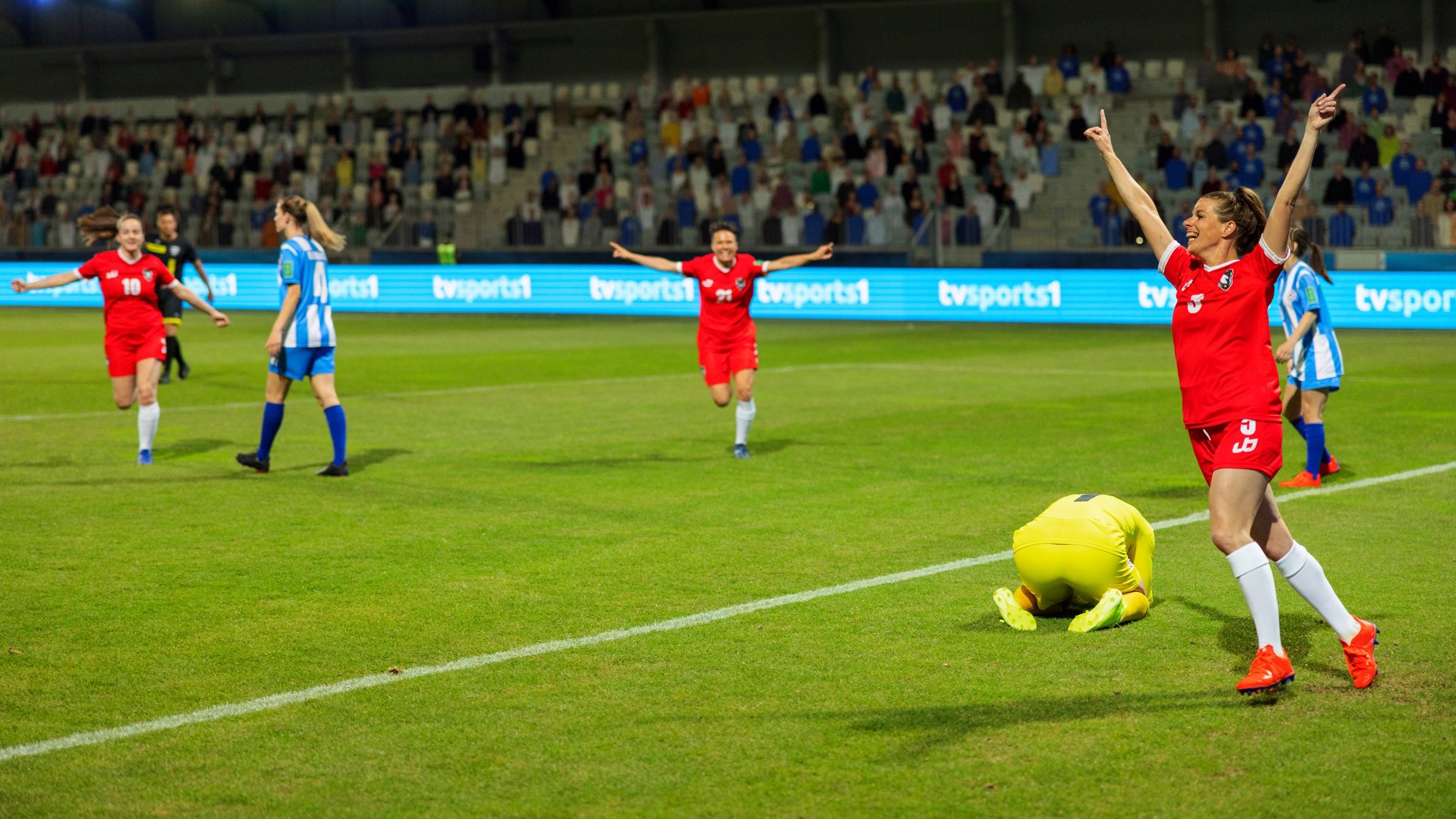 Football player celebrating after scoring